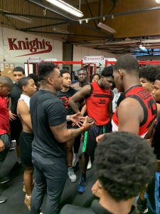 Coach in weight room